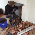 Preparing fireplace opening for lintel and hearth