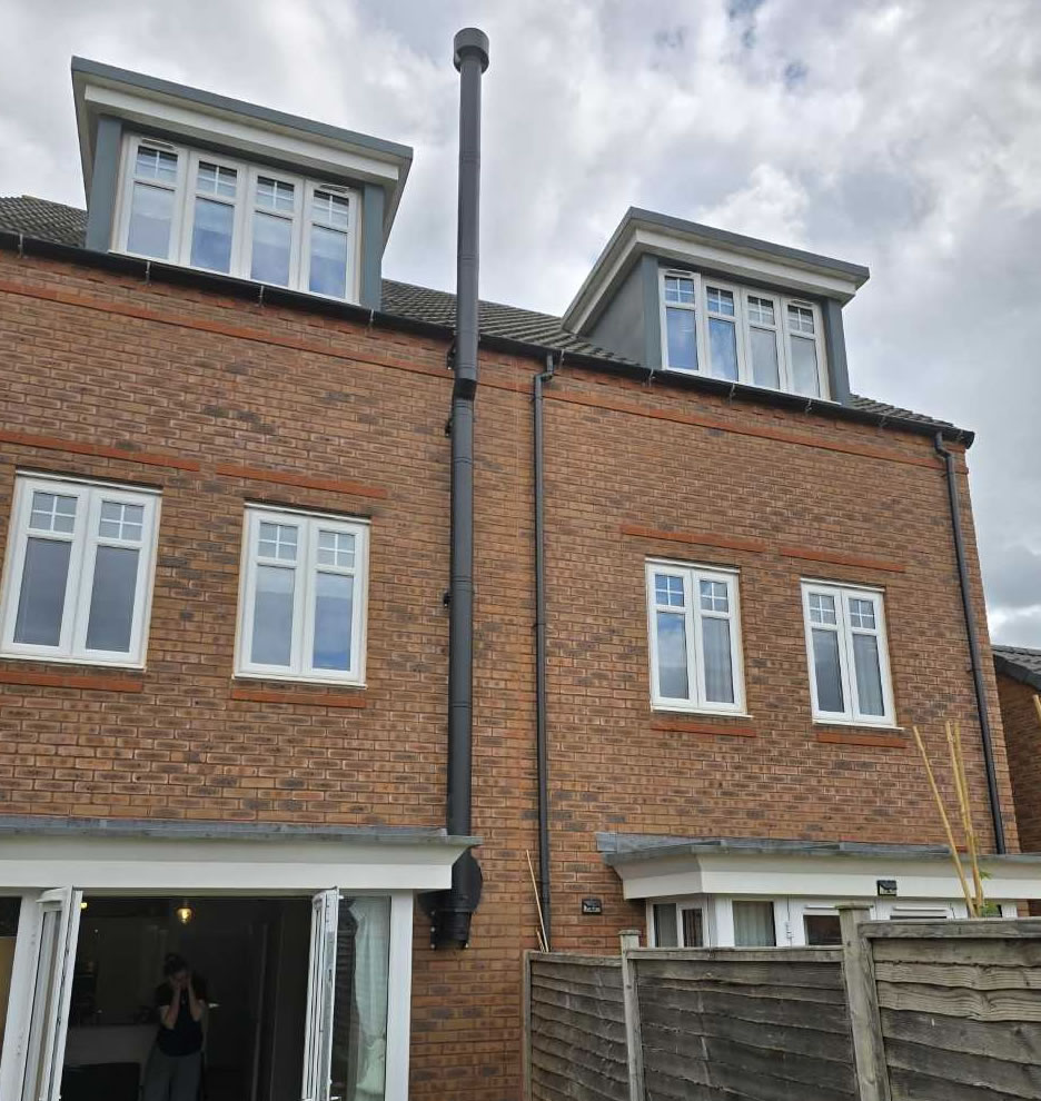 wood burner installation new build exterior chimney Taunton